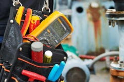 Photo 1. Electricians count on their tools to keep them safe. Examples include insulated hand tools and a properly rated digital multimeter.