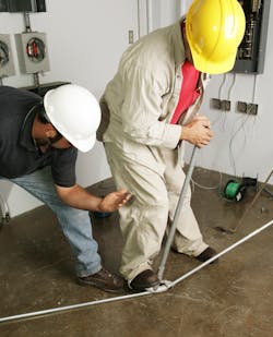 Photo 1. An electrical apprentice is learning how to bend &frac12;-in. EMT, which is covered by Art. 358 in the NEC.