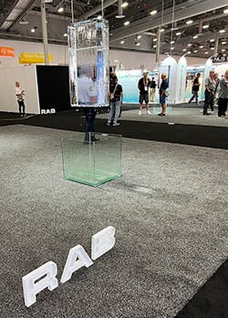 RAB Lighting went with a minimalist approach for its booth at LightFair. A RAB spokesperson said the two giant melting ice cubes suspended from the convention hall&apos;s rafters were intended to represent global warming, and how the company&apos;s lighting portfolio offers solutions to enhance sustainability on the planet.