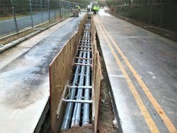 The power distribution system for the main campus at NC State consists of 17 distribution feeders to serve approximately 100 buildings and two express feeders to serve central energy plants. The project, completed by RMF Engineering, included approximately 30,000 linear feet of new underground electrical duct bank, 55 new electrical switches, and 100 building transitions from the existing system to the new system.